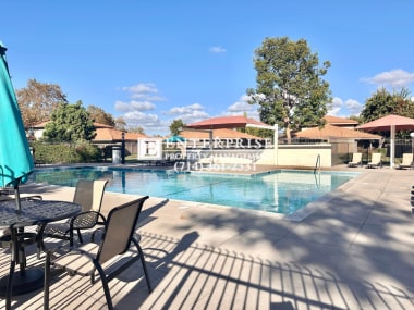 Building Photo - Luxury Living Made Easy: Your Tustin 2-Bedroom Condo Awaits with a Pool and Tennis Courts