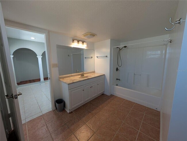 Building Photo - 6947 Bottle Brush Dr