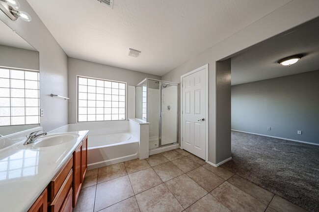 Building Photo - Welcome to this spacious 4 bedroom, 2.5 ba...