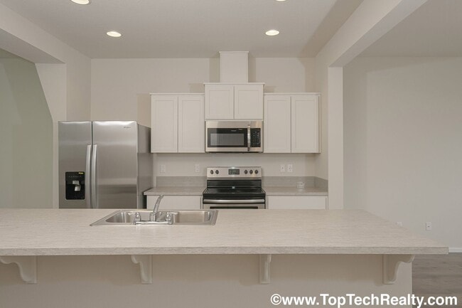 Building Photo - Beautiful North Bethany 3BR 2.5BA Townhome! Great Location, A+Schools!
