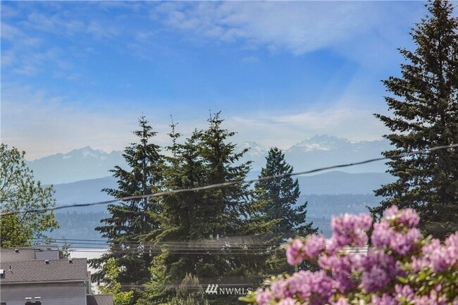 Building Photo - Timeless Charm Meets Thoughtful Updates in This Light-Filled Retreat