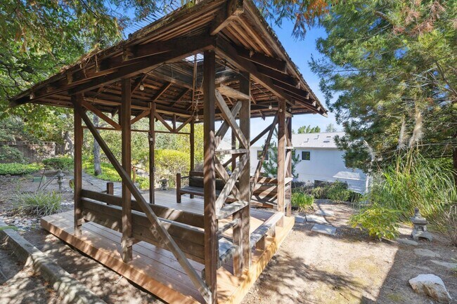Building Photo - Elegant Two-Story Home with Backyard Oasis...