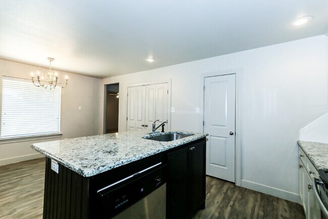 Building Photo - Half Off First Full Month's Rent! A Premie...