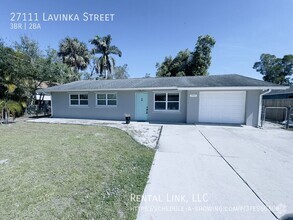 Building Photo - Newly updated home with a modern kitchen, ...