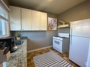 Building Photo - 2044 International Blvd - Sunny Studios an...