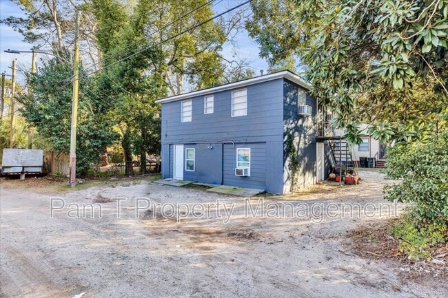 Building Photo - 1408 1/2 E 38th Upper