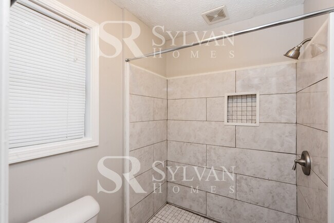 Building Photo - This lovely home is ready for your personal touch!