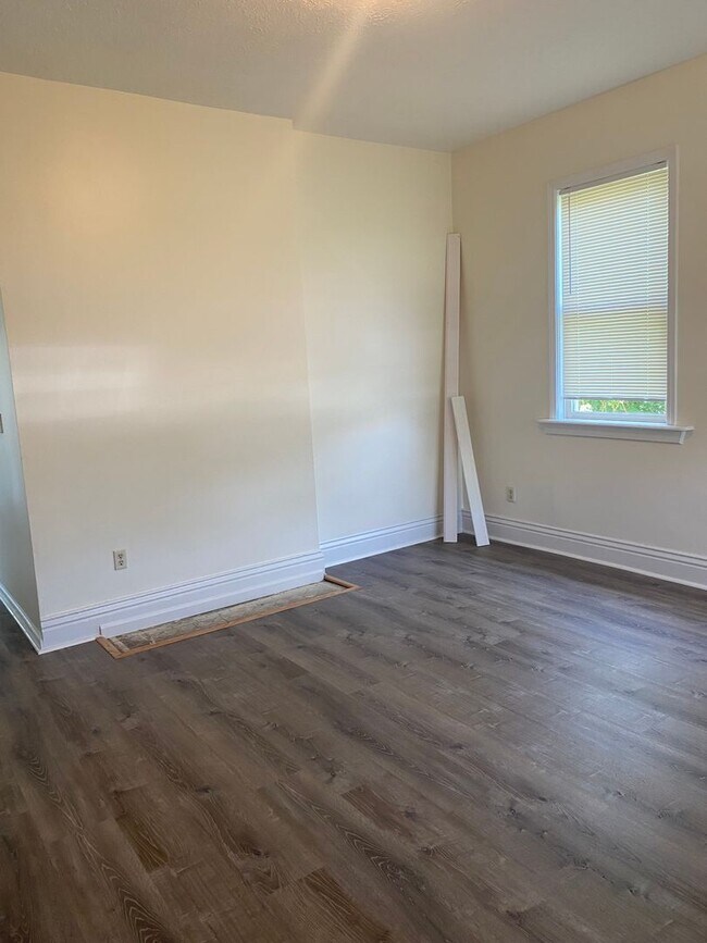 Building Photo - Updated three bedroom two bathroom home in...