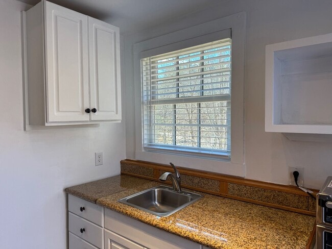 Building Photo - East AVL - Studio Apartment, Large Deck, Winter Views!