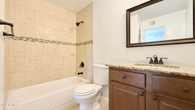 Building Photo - 8608 E Vernon Ave