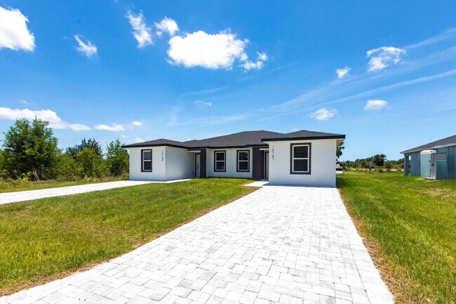 Building Photo - BRAND NEW Construction, 3 bed / 2 bath Rent-Ready Home in Port Charlotte!