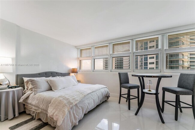 Building Photo - 10275 Collins Ave