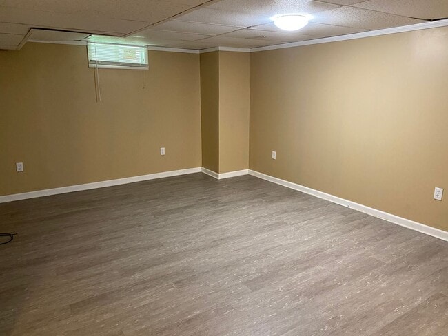 Building Photo - Spacious 4-Bedroom Home with Garage and Backyard in Milan!