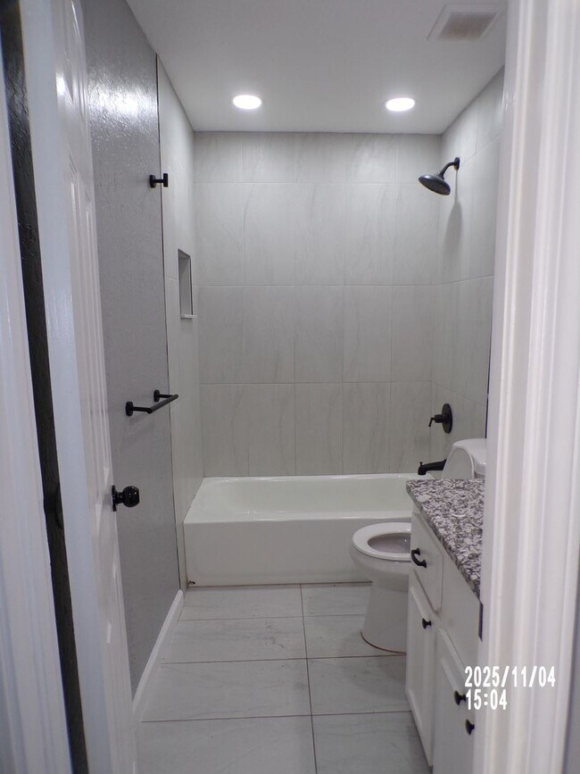 Building Photo - Fresh Paint!!, New Flooring and Granite Co...