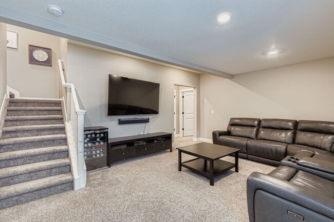 Building Photo - Welcome to this Beautifully Maintained 4-B...