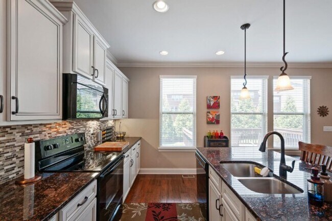 Building Photo - Coming Soon. The Reserve at Stone Hall. Custom home with 2,749 sq ft 4 BR 3 baths, walk to Ravenw...
