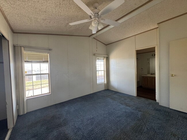 Building Photo - Sunrise Vista -2 Br, 2Ba home with covered carport, fenced yard, storage