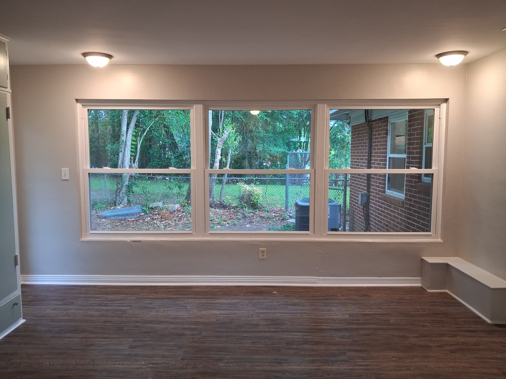 Back bedroom wall of new windows overlooking the patio - 614 N Gadsden St