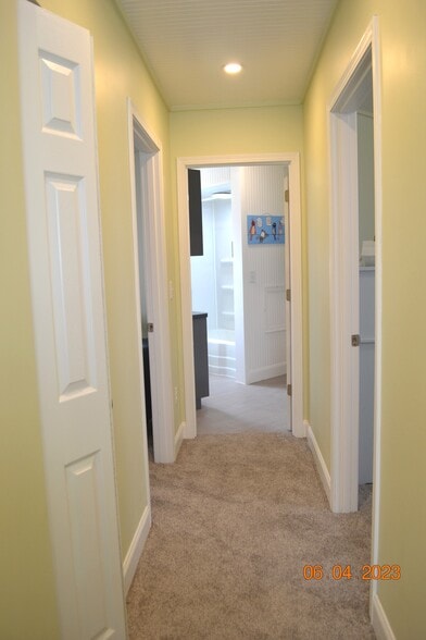 upstairs-Bedrooms 2 and 3 and full bath open off central hall - 222 W Peck St