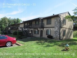 Building Photo - Pet Friendly Condo close to town, ready to...