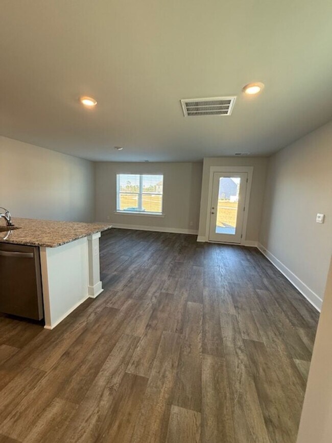 Building Photo - Be the first to Live in This Brand-New Townhome!