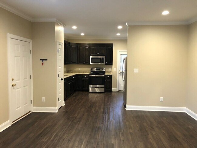 Building Photo - "Brand New Construction." Quiet location, charming, cozy 3 bedroom duplex