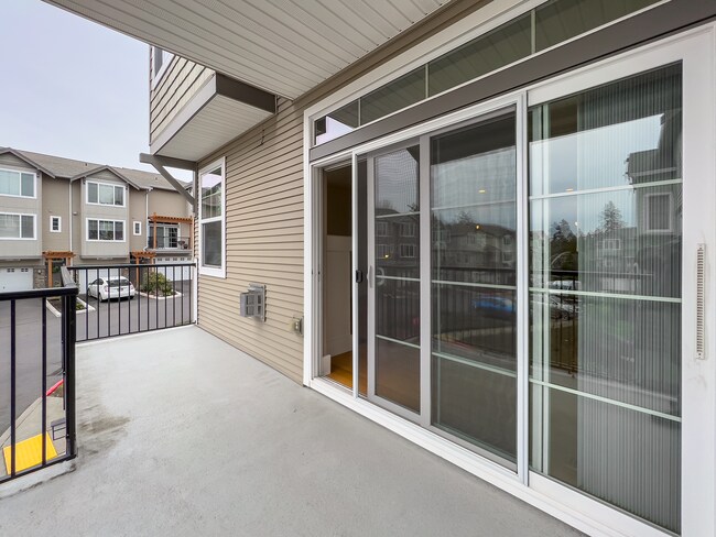 Building Photo - Enjoy this 3 Bedroom 2.5 Bathroom End Townhome ~ 2 Car Garage + Washer & Dryer! Great Cedar Mill ...