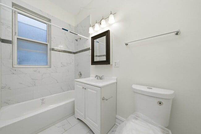 Building Photo - 7442 S Langley Ave