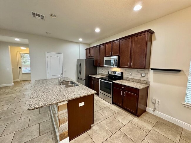 Building Photo - 7208 Milestone Dr