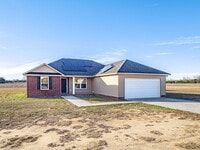 Building Photo - Available now! Has solar panels!