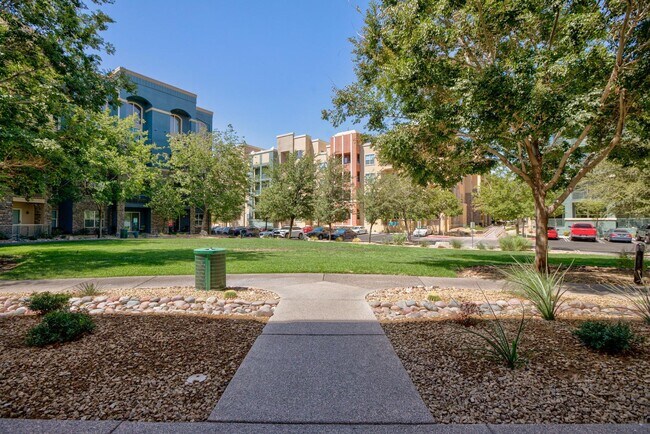 Building Photo - Partially Furnished Condo | Gourmet Kitchen, Pool & Fitness Center | 6-Month Lease Available