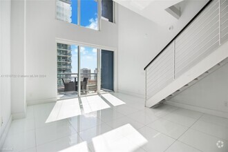 Building Photo - 1 br, 1.5 bath Condo - 60 SW 13th St Apt 2208