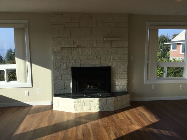 Building Photo - Modern 4-Bedroom Home with Panoramic Water & Mountain Views