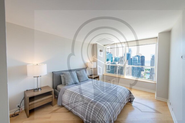 Building Photo - Stunning 46th Floor, 2 bedroom condo, righ...