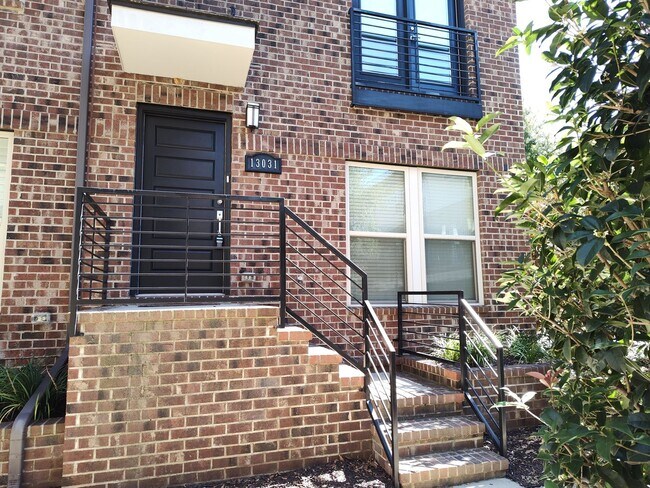 Primary Photo - Modern End-Unit Townhome located in the Ce...