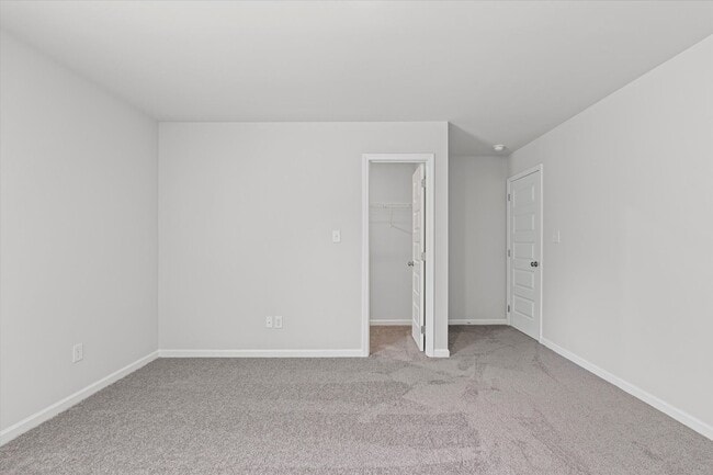 Building Photo - New 3BR Home in Whispering Woods – Modern ...