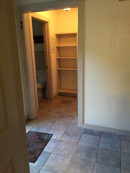 Rear Foyer w/built-in bookcase - 541 E Jones Ln