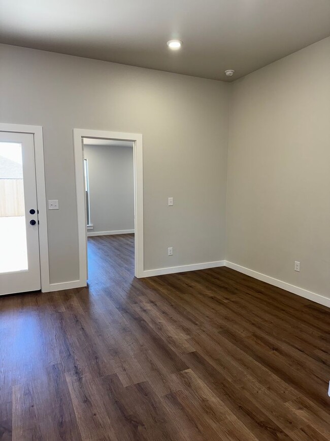 Building Photo - Brand New Construction 3/2/2  1/2 off spec...