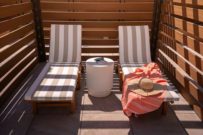 Poolside Cabanas with Lounge Chairs - Current Apartments