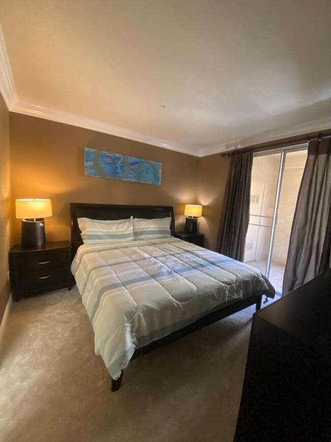 Building Photo - Fully furnished 2 bedroom unit in 24/7 guard gated community