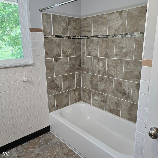 Building Photo - 10016 E Troy Ave