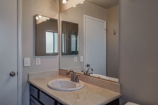 Building Photo - Modern Comfort with Pool & Spa in The Lakes – Solar Equipped Home