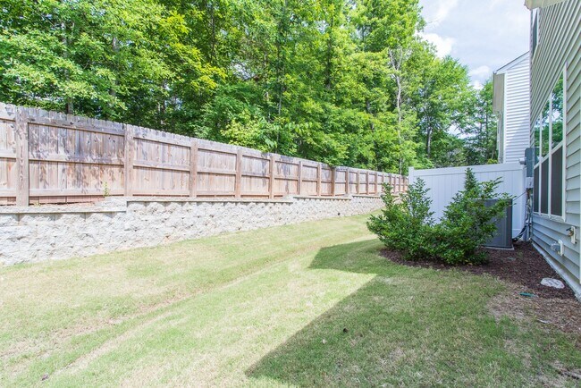 Building Photo - Spacious, Stylish & Move-In Ready! 3BR End Unit Townhome in Durham