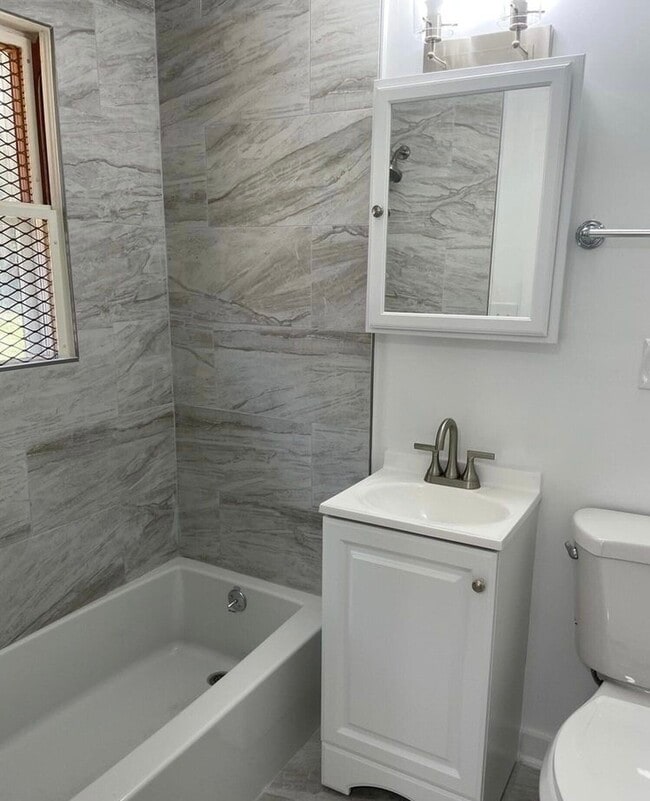 Building Photo - 71 E 56th St