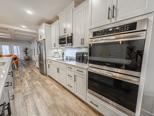 Building Photo - Modern 3 Bed 2.5 Bath End-Unit Townhome With Deck In The Landing At Cannon Branch