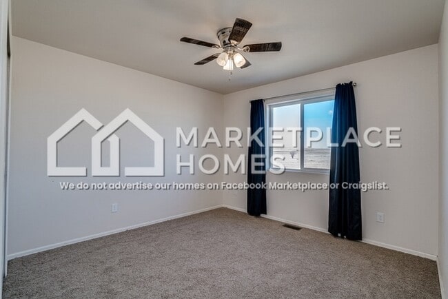 Building Photo - 9799 Desert Lily Cir