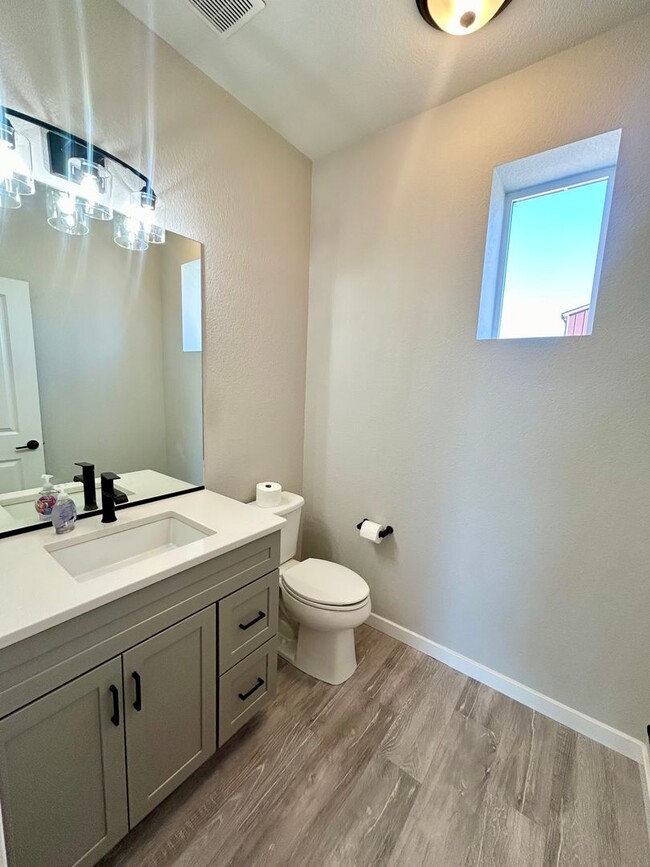Building Photo - Impressive 4 Bedroom Townhome Nestled in M...