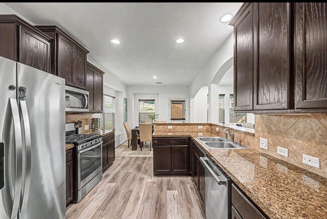 Building Photo - 24423 Hikers Bend Dr