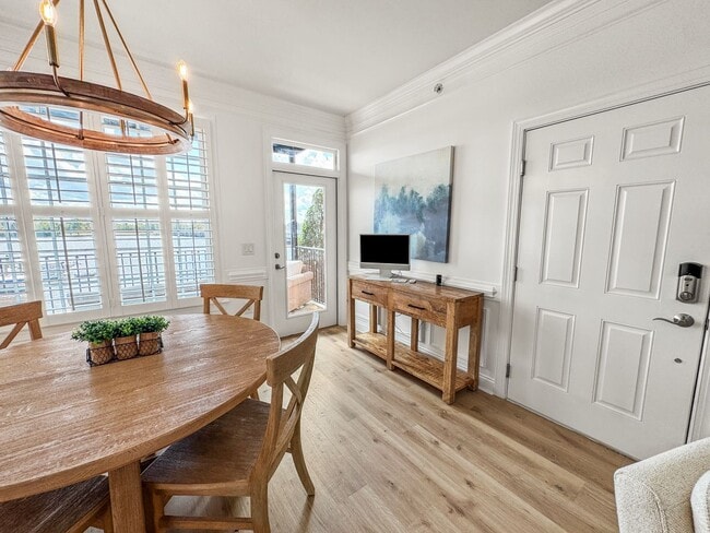 Building Photo - Fully Furnished Waterfront Elegance on Mai...