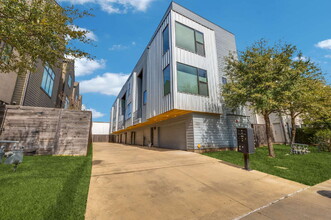 Building Photo - Live Above It All | Sleek Multi-Level Condo with Private Rooftop Deck